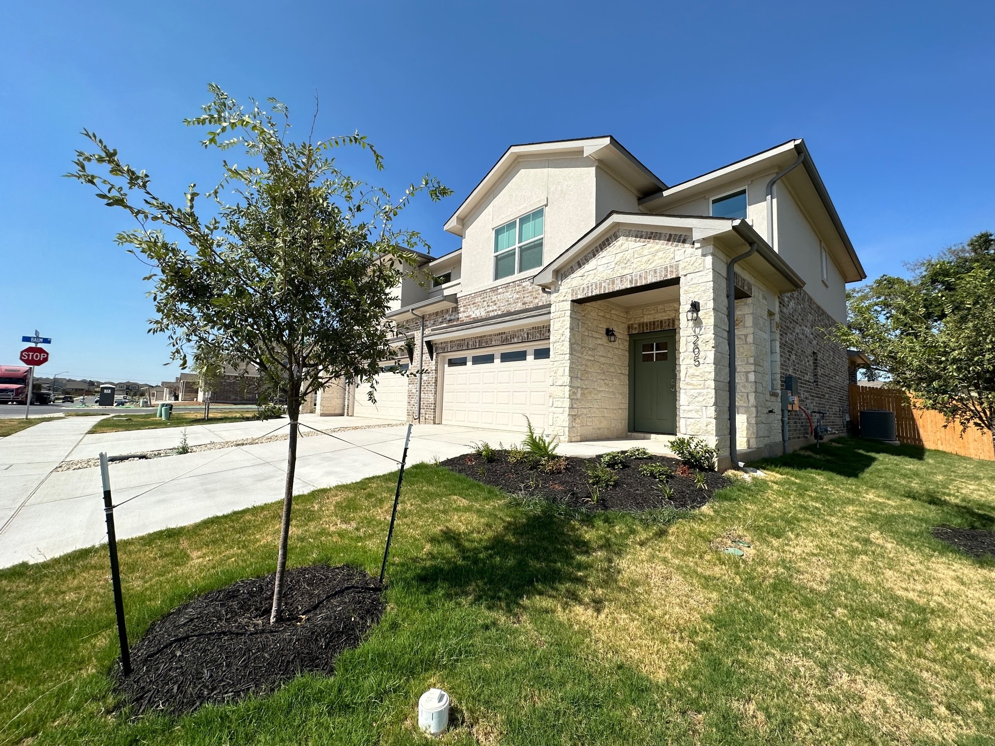 205 Saide Street Georgetown, TX 78626 - Photo 2 of 31 a front view of a house with a yard