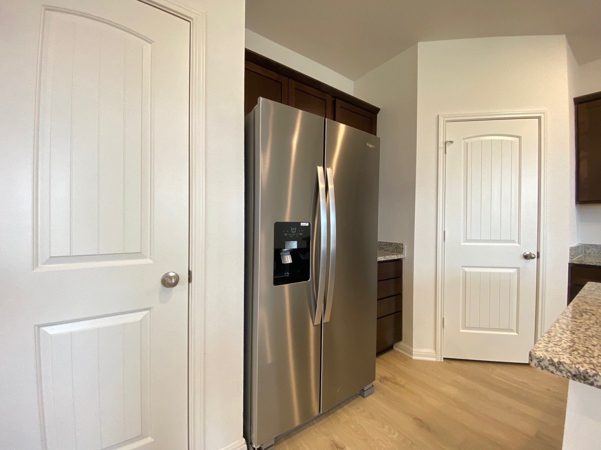 205 Saide Street Georgetown, TX 78626 - Photo 21 of 31 a view of a hallway with wooden floor