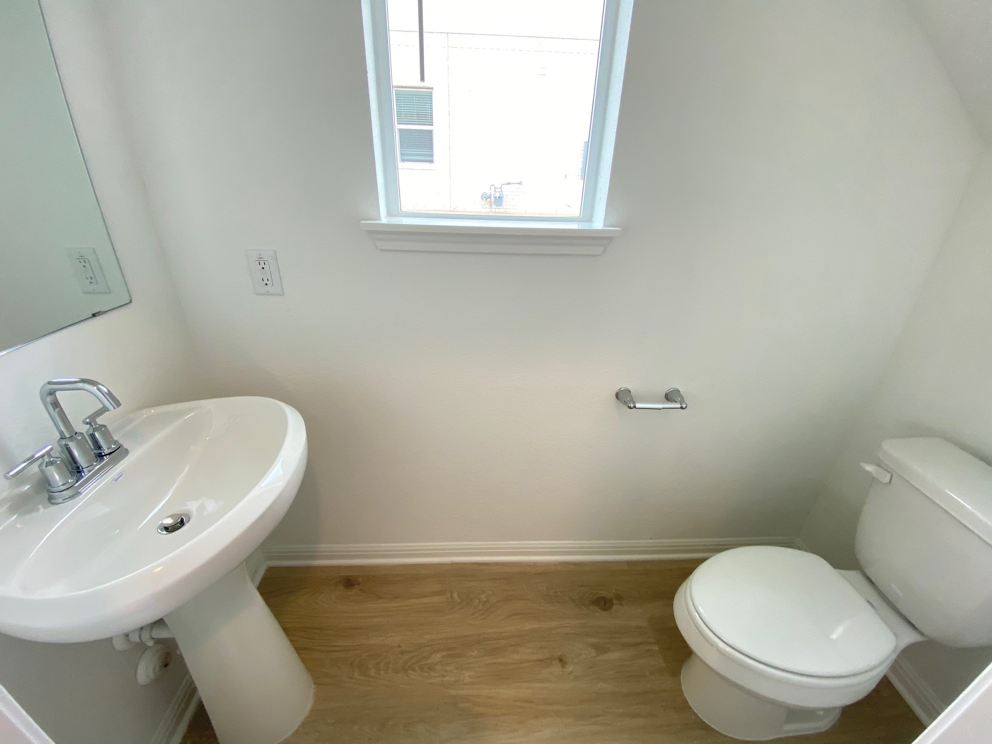 205 Saide Street Georgetown, TX 78626 - Photo 22 of 31 a bathroom with a toilet a sink and a window