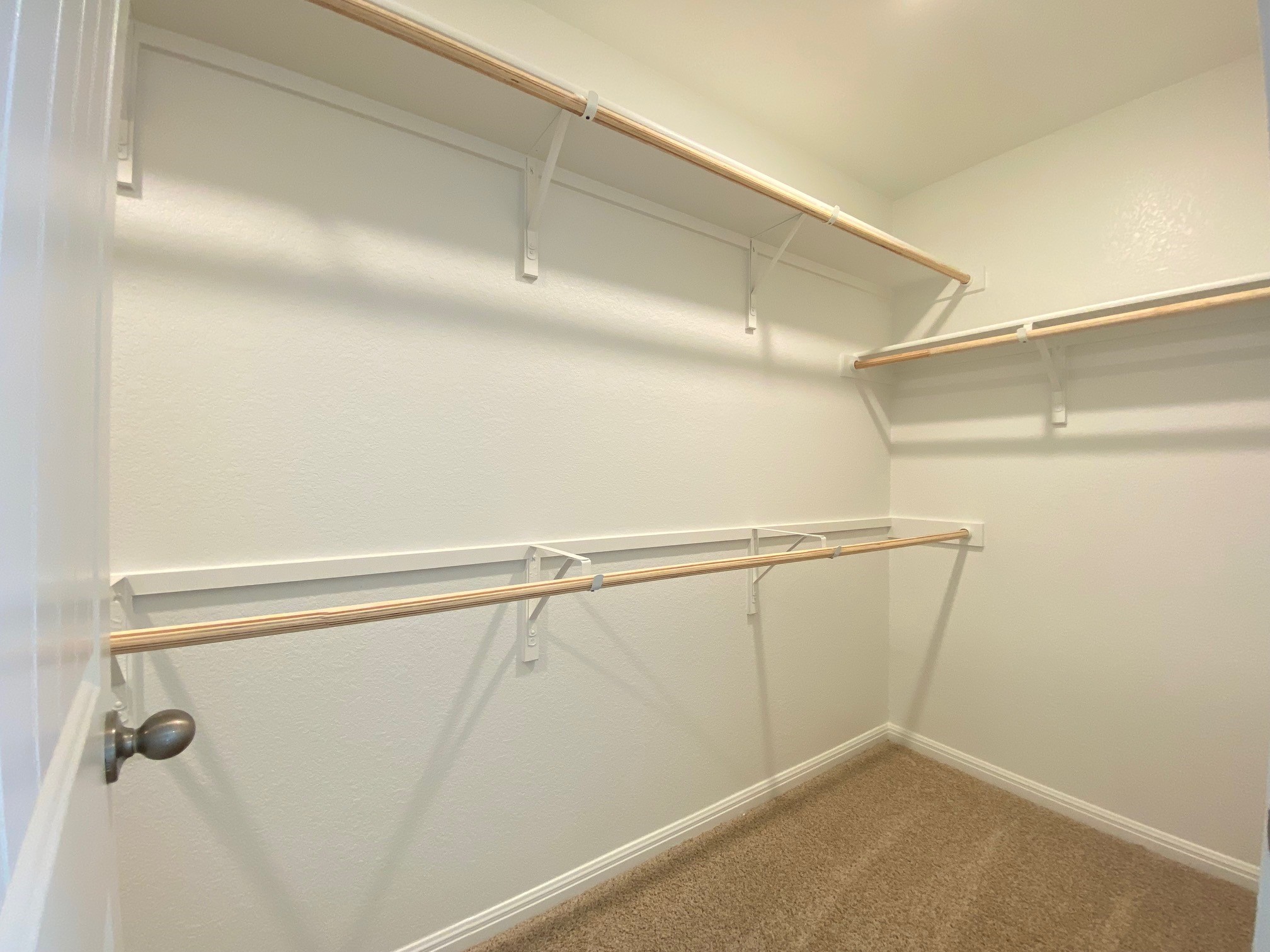205 Saide Street Georgetown, TX 78626 - Photo 28 of 31 a view of a room with racks on the wall