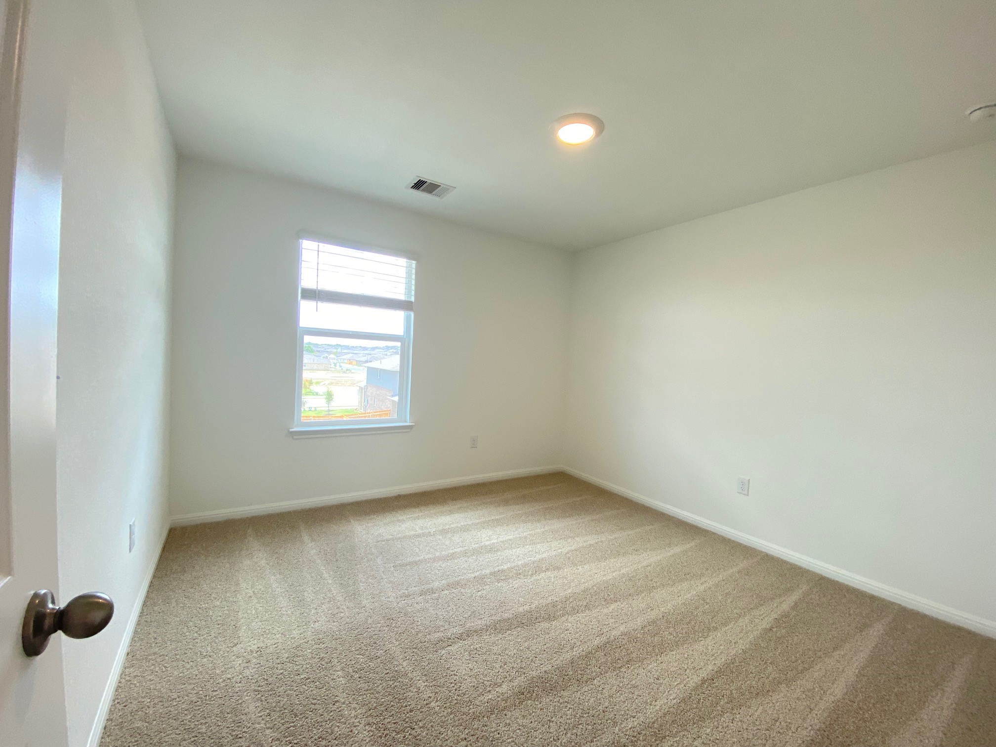 205 Saide Street Georgetown, TX 78626 - Photo 6 of 31 an empty room with a window