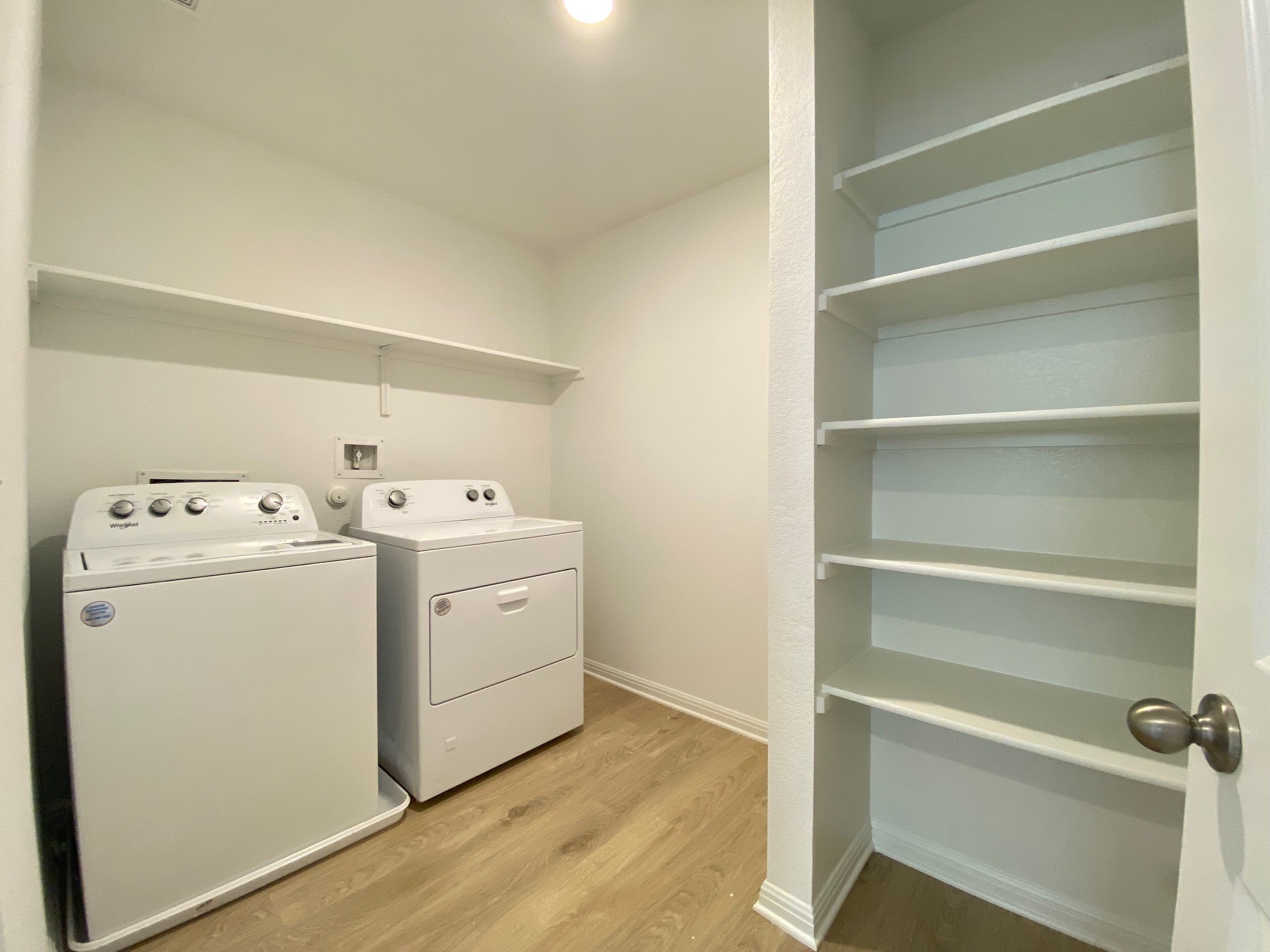 205 Saide Street Georgetown, TX 78626 - Photo 8 of 31 a utility room with dryer and washer