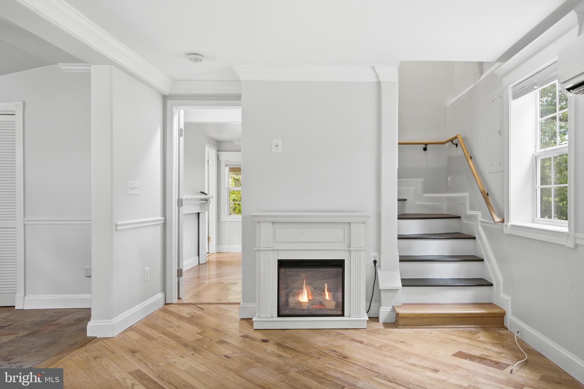 1804 Sixes Road Prince Frederick, MD 20678 - Photo 11 of 32 Cozy fireplace centerpiece.