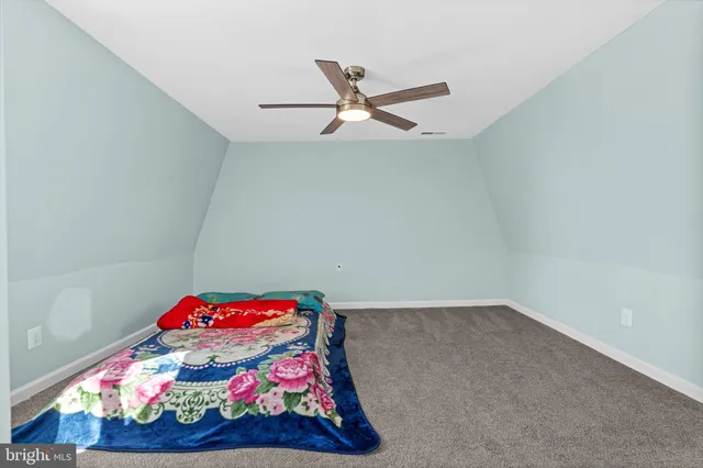 a room with toys and a wall painting