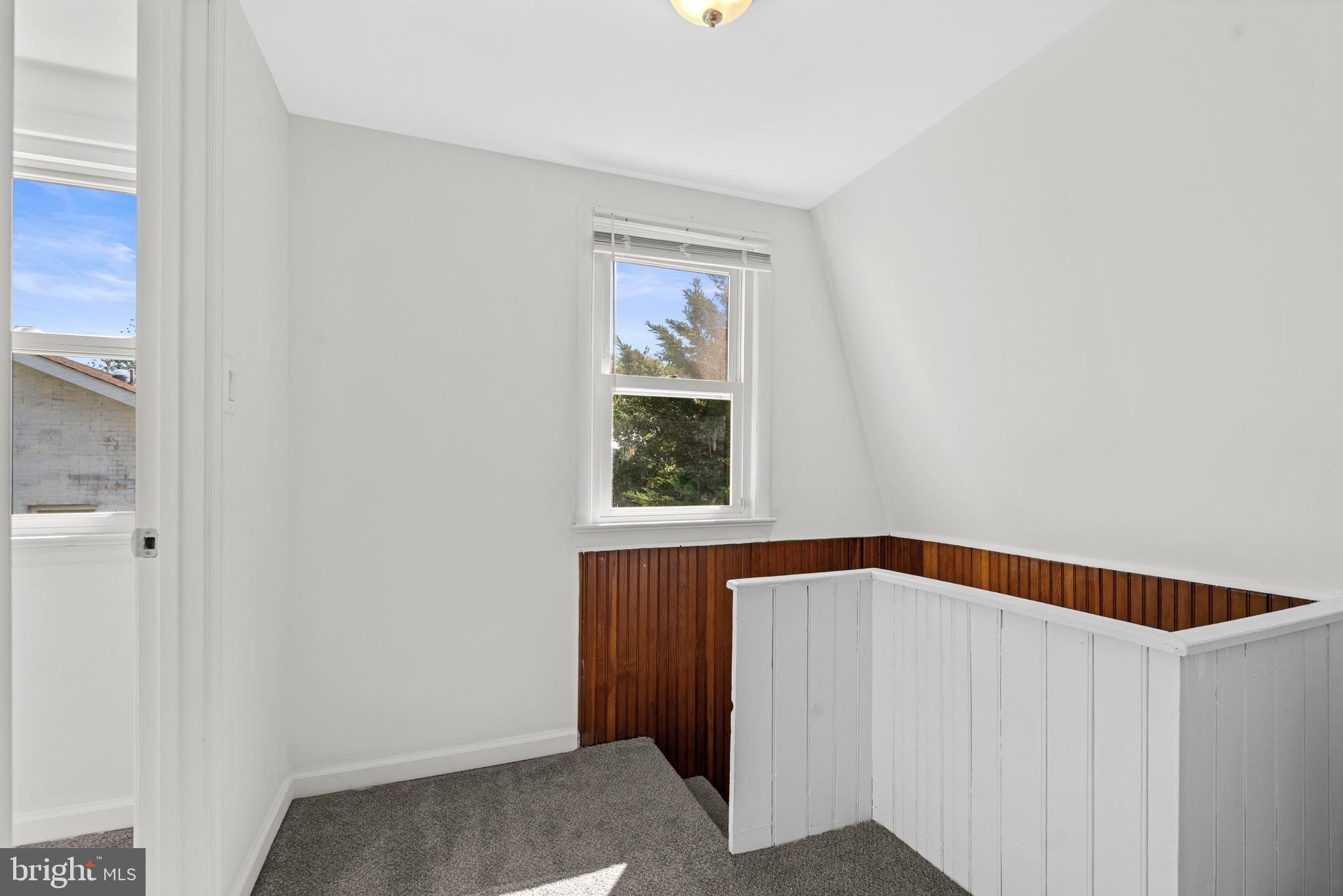 17203 Piney Point Road Piney Point, MD 20674 - Photo 12 of 43 a view of an empty room with a window