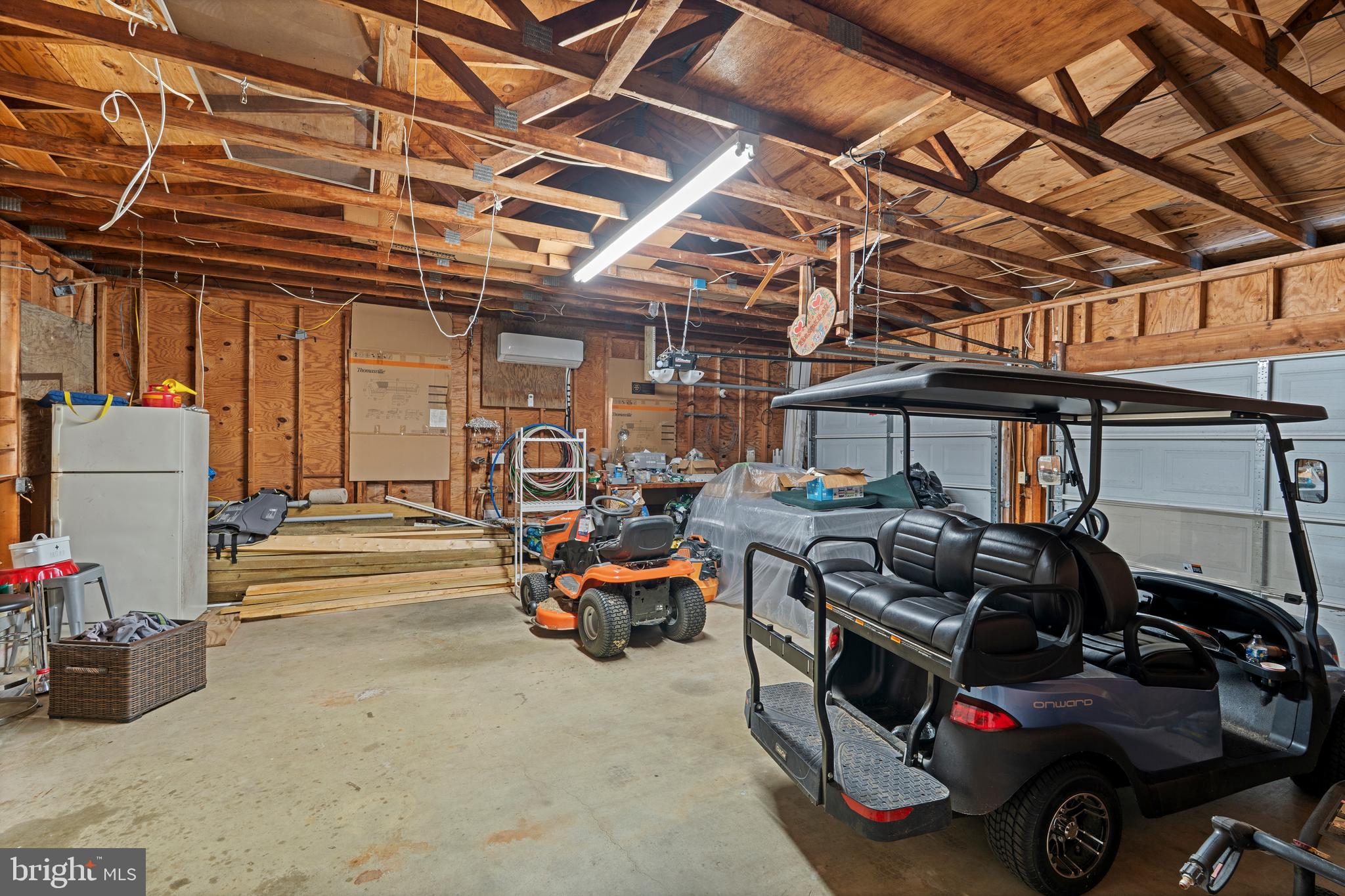 17203 Piney Point Road Piney Point, MD 20674 - Photo 36 of 43 a view of parking garage with cars