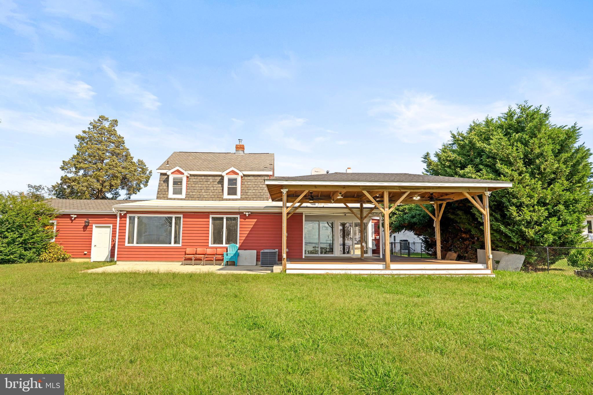17203 Piney Point Road Piney Point, MD 20674 - Photo 37 of 43 front view of a house with a yard