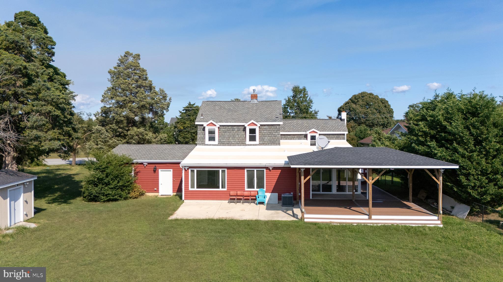 17203 Piney Point Road Piney Point, MD 20674 - Photo 41 of 43 a aerial view of a house with a yard