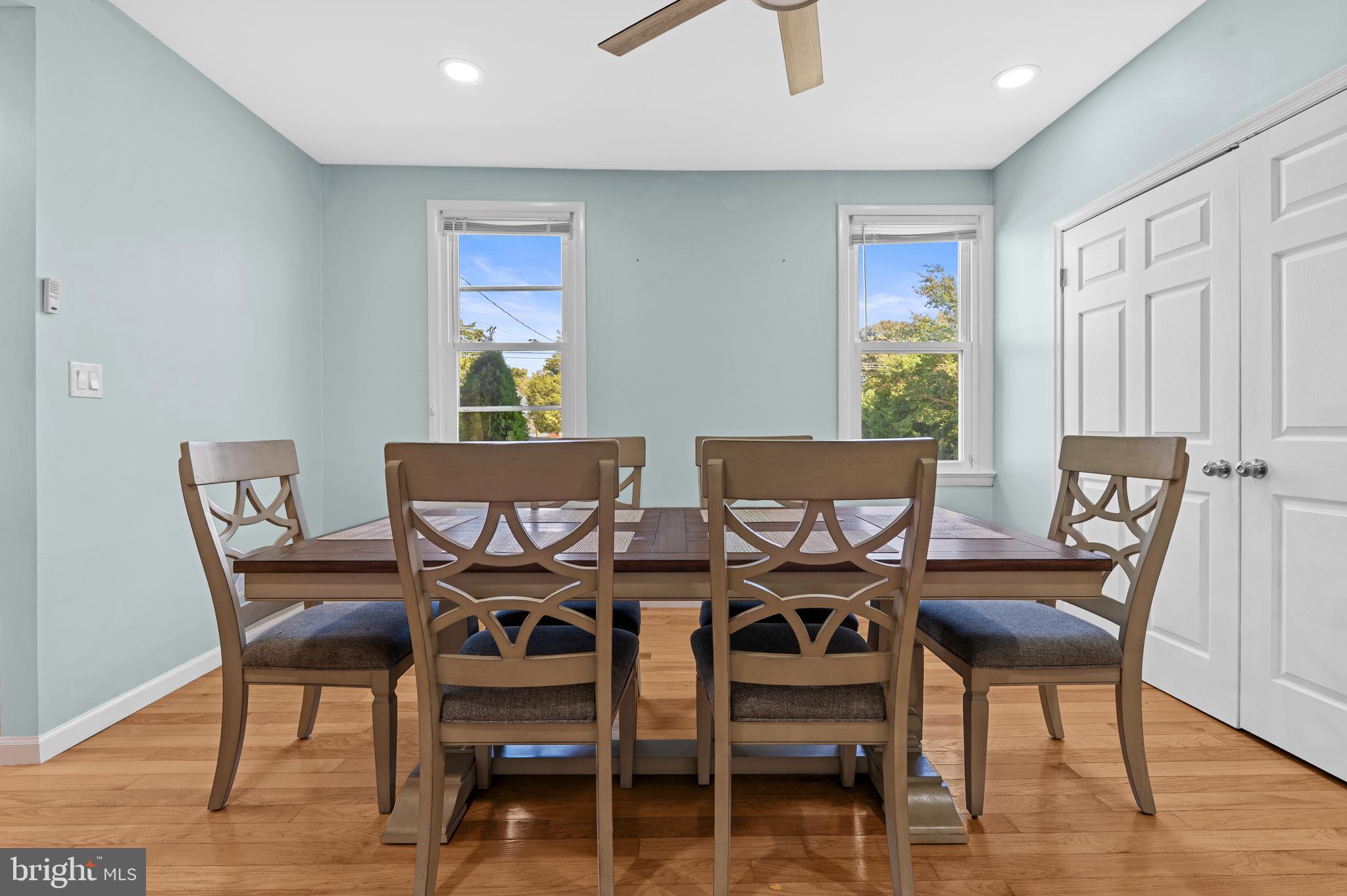 17203 Piney Point Road Piney Point, MD 20674 - Photo 5 of 43 a view of a dining room with furniture window and wooden floor