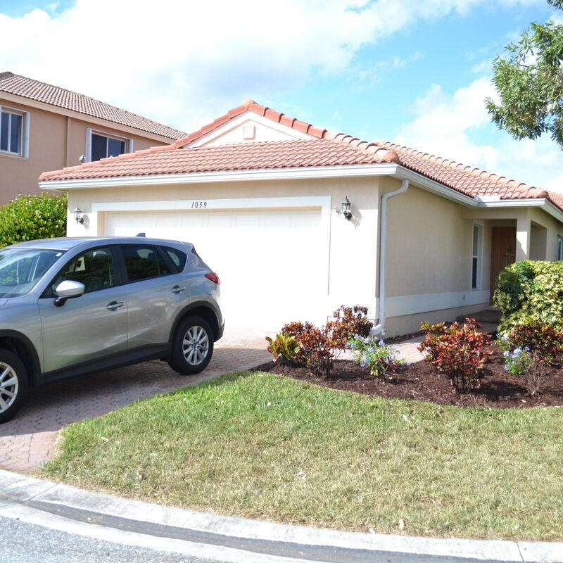 1059 Big Torch Street Riviera Beach, FL 33407 - Photo 1 of 18 1