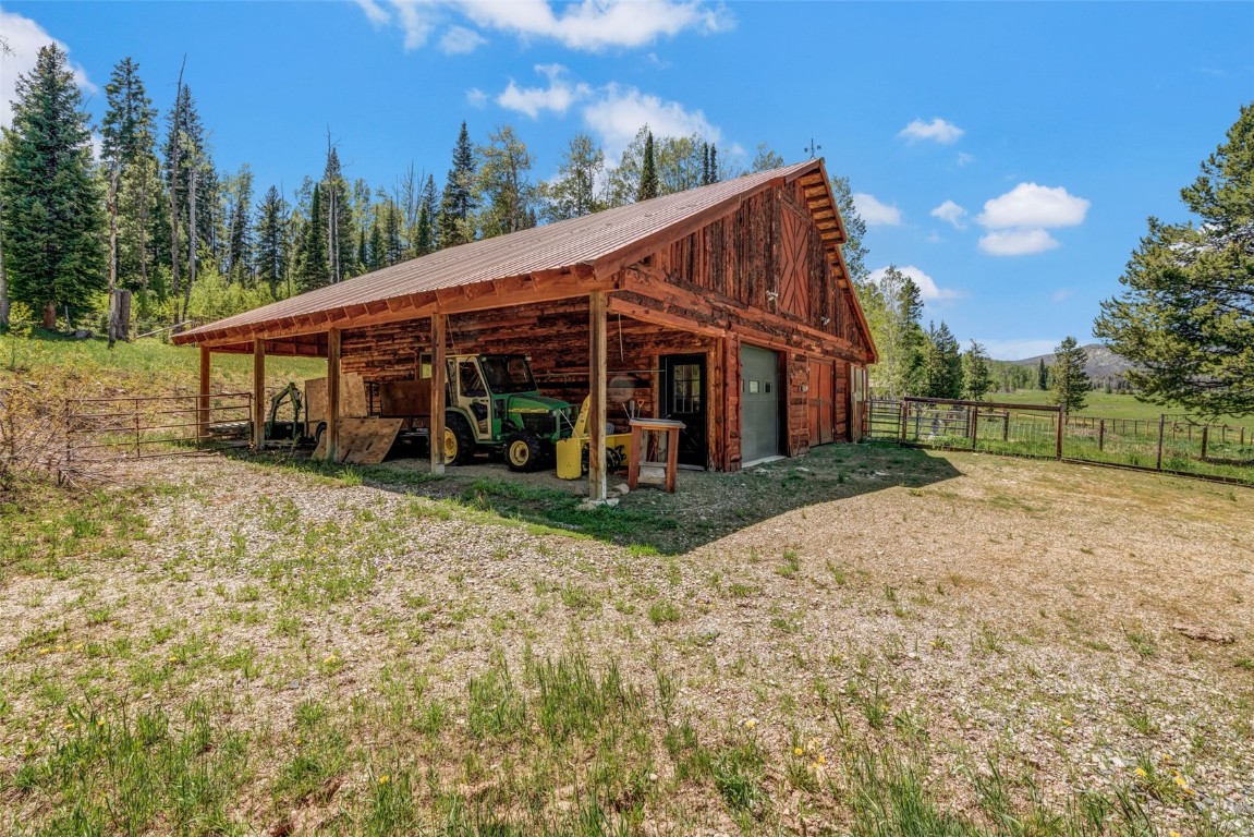 60455 Floyd Creek Road Clark, CO 80428 - Photo 48 of 50 a view of house with a yard