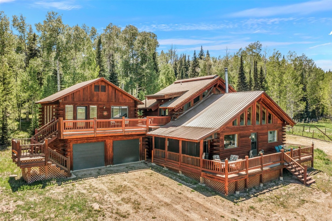 60455 Floyd Creek Road Clark, CO 80428 - Photo 5 of 50 an aerial view of a house with a big yard