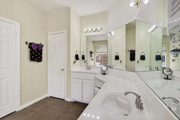 a view of an empty room and a window