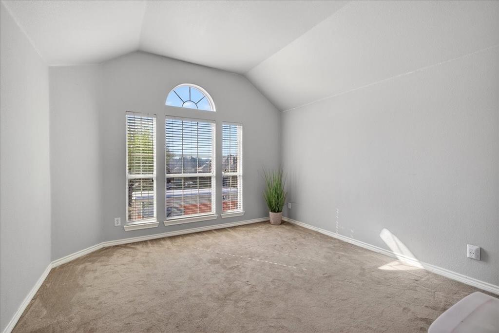 7308 Hawk Lane Sachse, TX 75048 - Photo 29 of 37 an empty room with windows