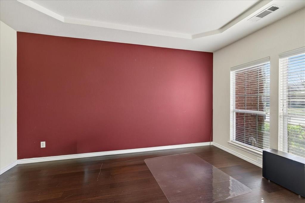 7308 Hawk Lane Sachse, TX 75048 - Photo 4 of 37 an empty room with windows
