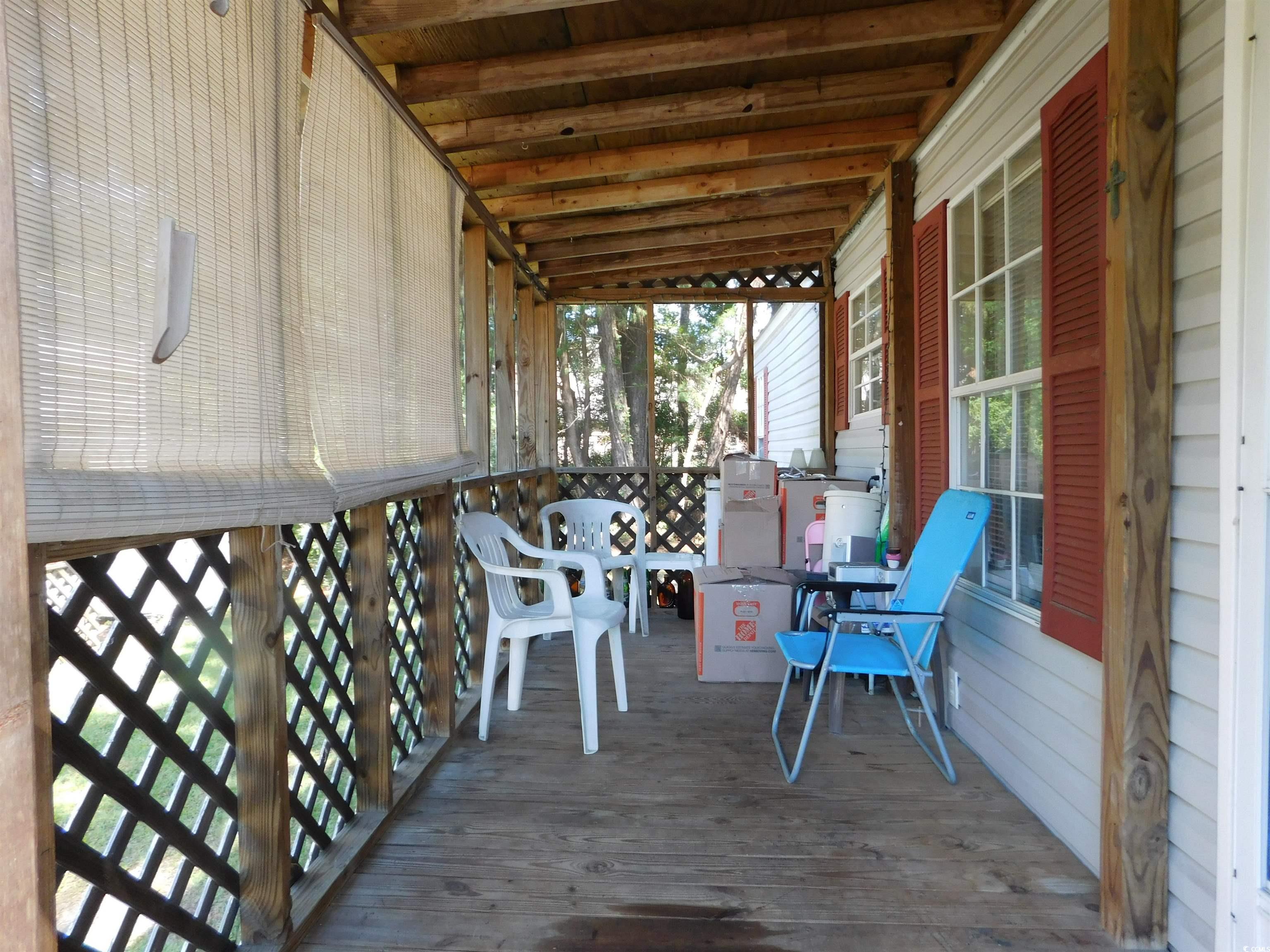 112 Offshore Drive Murrells Inlet, SC 29576 - Photo 5 of 14 View of wooden deck