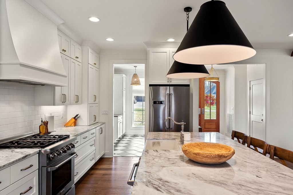 2311 Boyd Farris Road Cookeville, TN 38506 - Photo 14 of 74 a kitchen with stainless steel appliances granite countertop a stove and cabinets