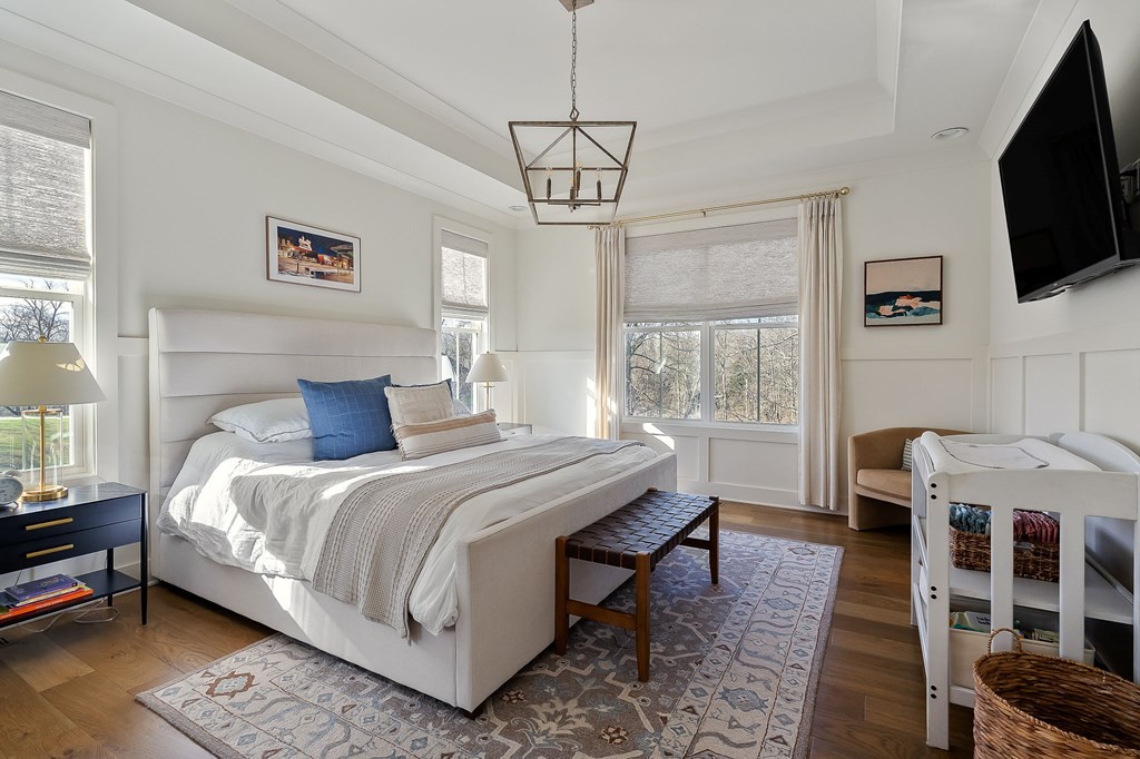 2311 Boyd Farris Road Cookeville, TN 38506 - Photo 24 of 74 a bedroom with a bed a flat screen tv and a window