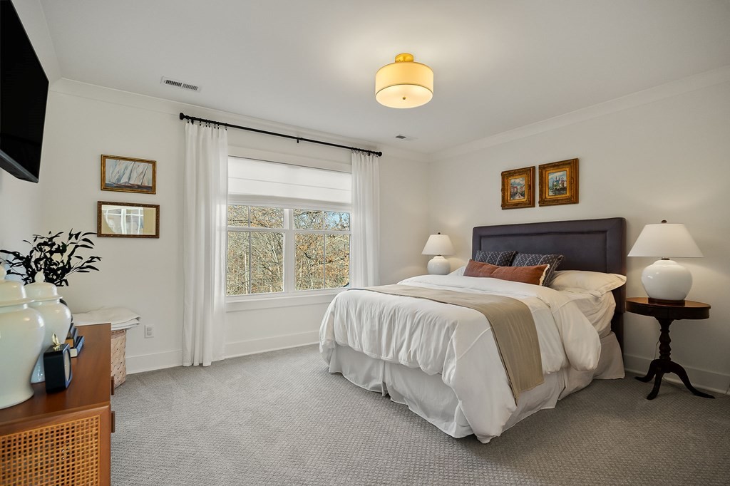 2311 Boyd Farris Road Cookeville, TN 38506 - Photo 30 of 74 a spacious bedroom with a bed and a window