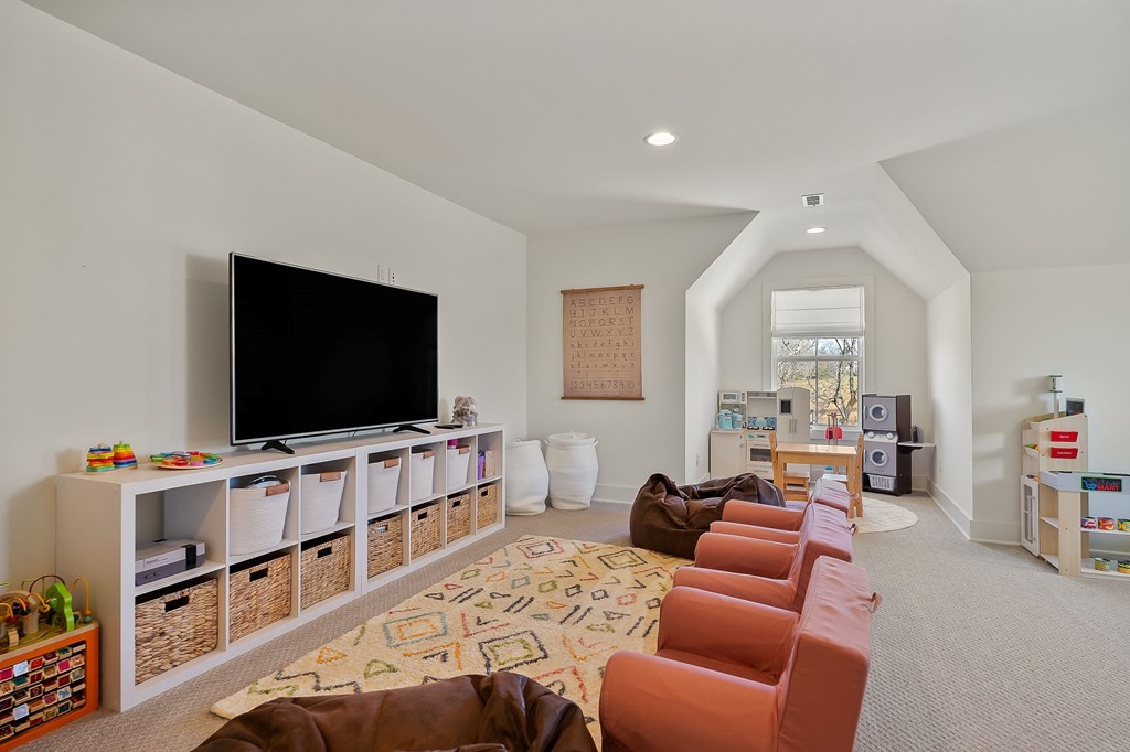 2311 Boyd Farris Road Cookeville, TN 38506 - Photo 34 of 74 a living room with furniture and a flat screen tv