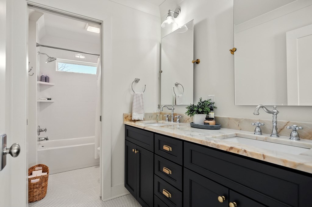 2311 Boyd Farris Road Cookeville, TN 38506 - Photo 36 of 74 a bathroom with a sink double vanity granite tub shower and a mirror