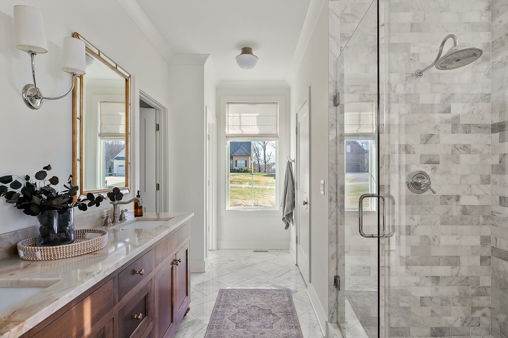 2311 Boyd Farris Road Cookeville, TN 38506 - Photo 38 of 74 a bathroom with a granite countertop sink mirror and shower