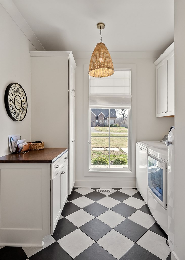 2311 Boyd Farris Road Cookeville, TN 38506 - Photo 47 of 74 a kitchen with stainless steel appliances granite countertop a stove a sink and a refrigerator