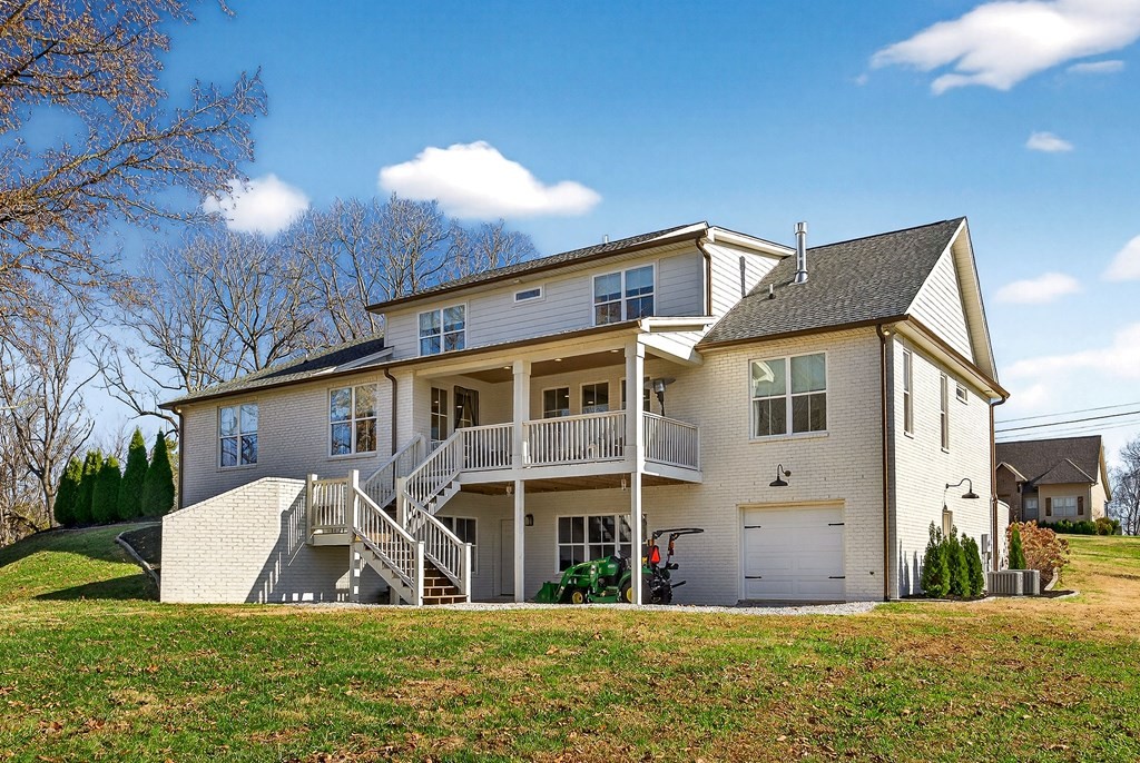 2311 Boyd Farris Road Cookeville, TN 38506 - Photo 62 of 74 a front view of a house with a yard