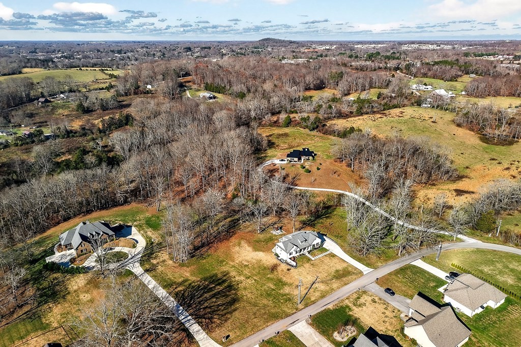 2311 Boyd Farris Road Cookeville, TN 38506 - Photo 70 of 74 an aerial view of a house with a mountain