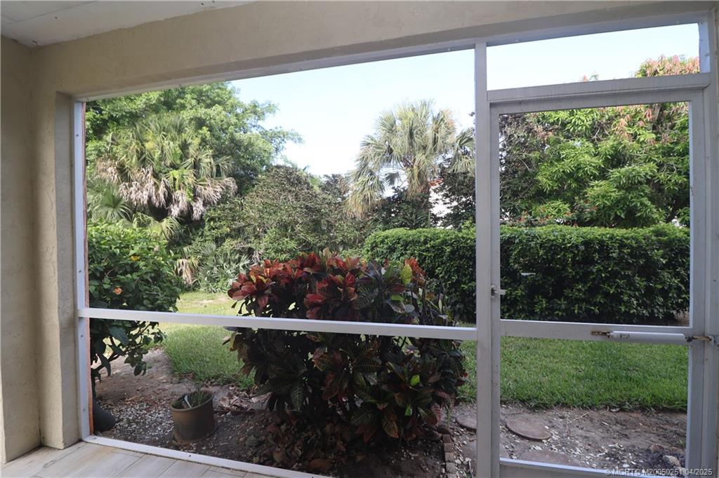2950 Southeast Ocean Boulevard, Unit 101 Stuart, FL 34996 - Photo 30 of 35 a view of a balcony with an outdoor space