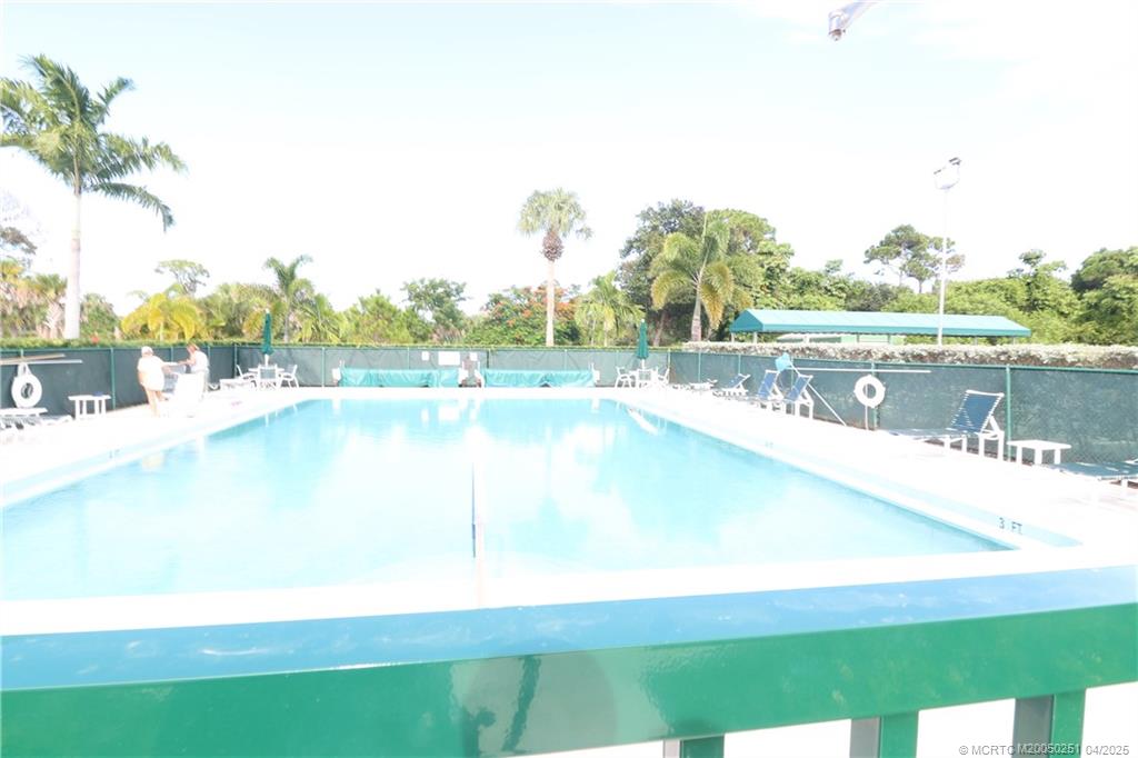 2950 Southeast Ocean Boulevard, Unit 101 Stuart, FL 34996 - Photo 32 of 35 a view of a lake with houses