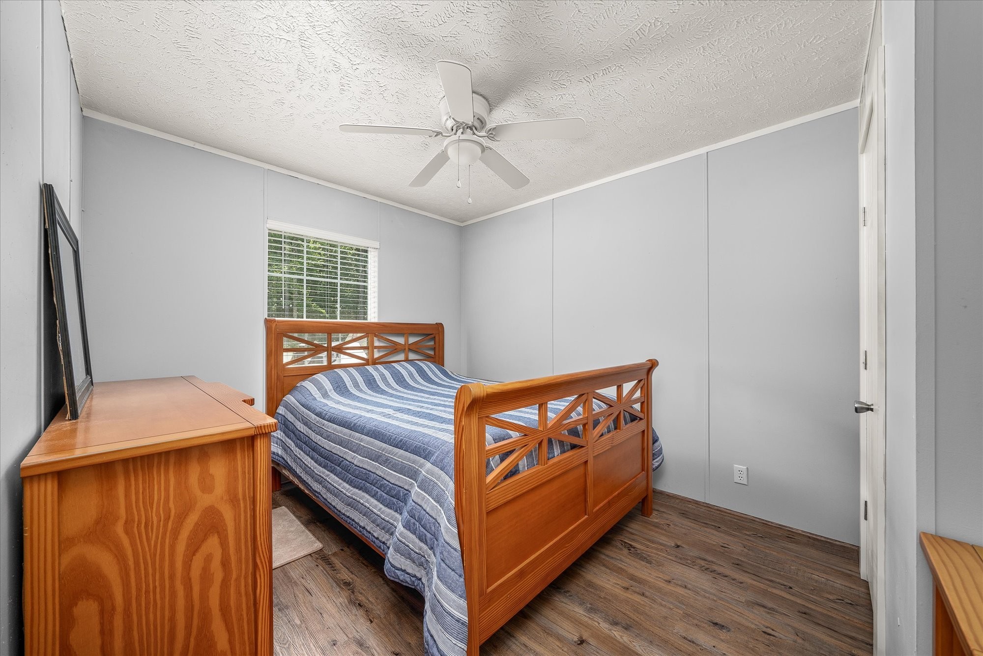 2025 Shiloh Road Decatur, TN 37322 - Photo 13 of 21 a view of a bedroom with furniture and wooden floor