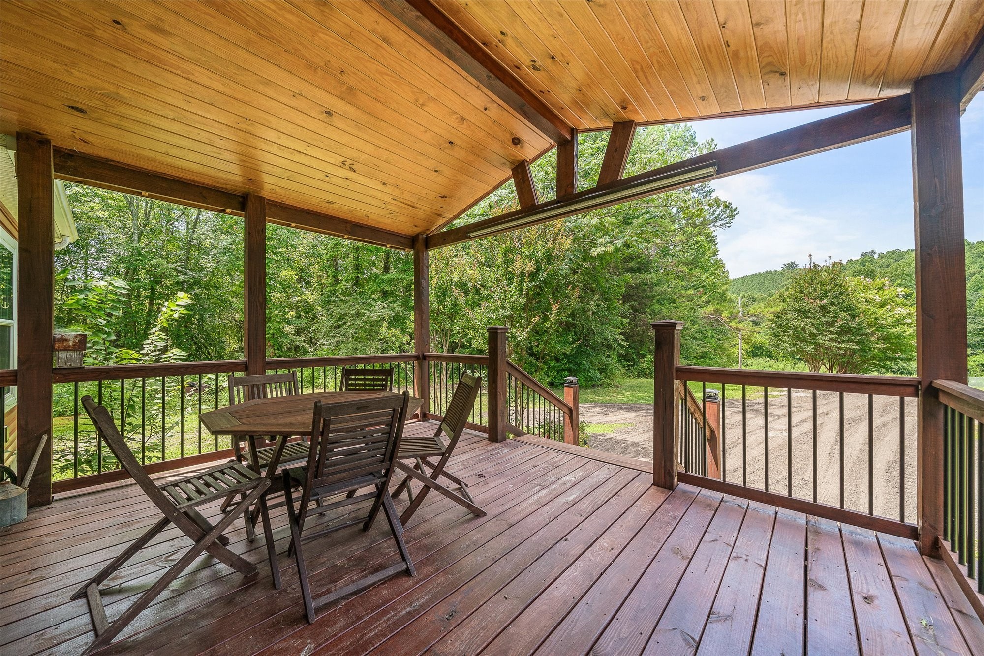 2025 Shiloh Road Decatur, TN 37322 - Photo 8 of 21 a view of a balcony with furniture and wooden floor