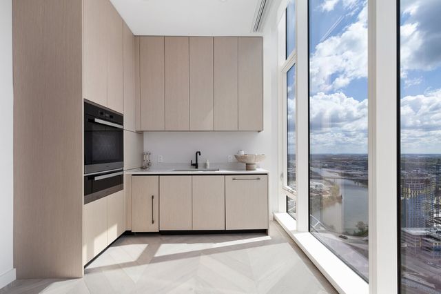 a view of a building with a palm tree