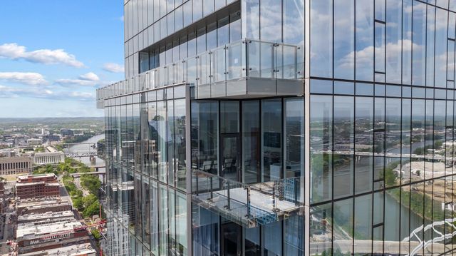 a view of a balcony with city view