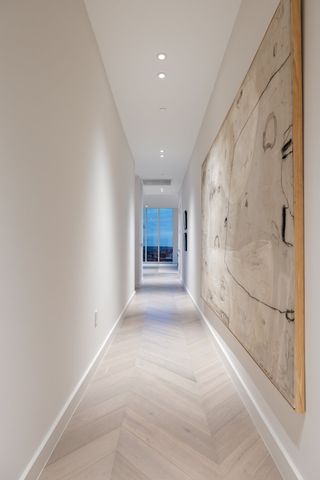 a bedroom with a bed and a cabinet