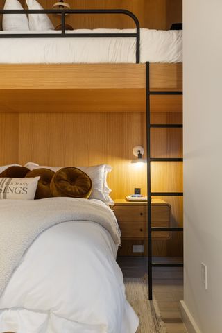 a bedroom with a large bed and a large window