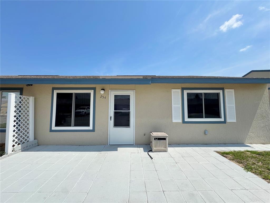 254 Winter Ridge Boulevard, Unit 254 Winter Haven, FL 33881 - Photo 1 of 1 a front view of a house