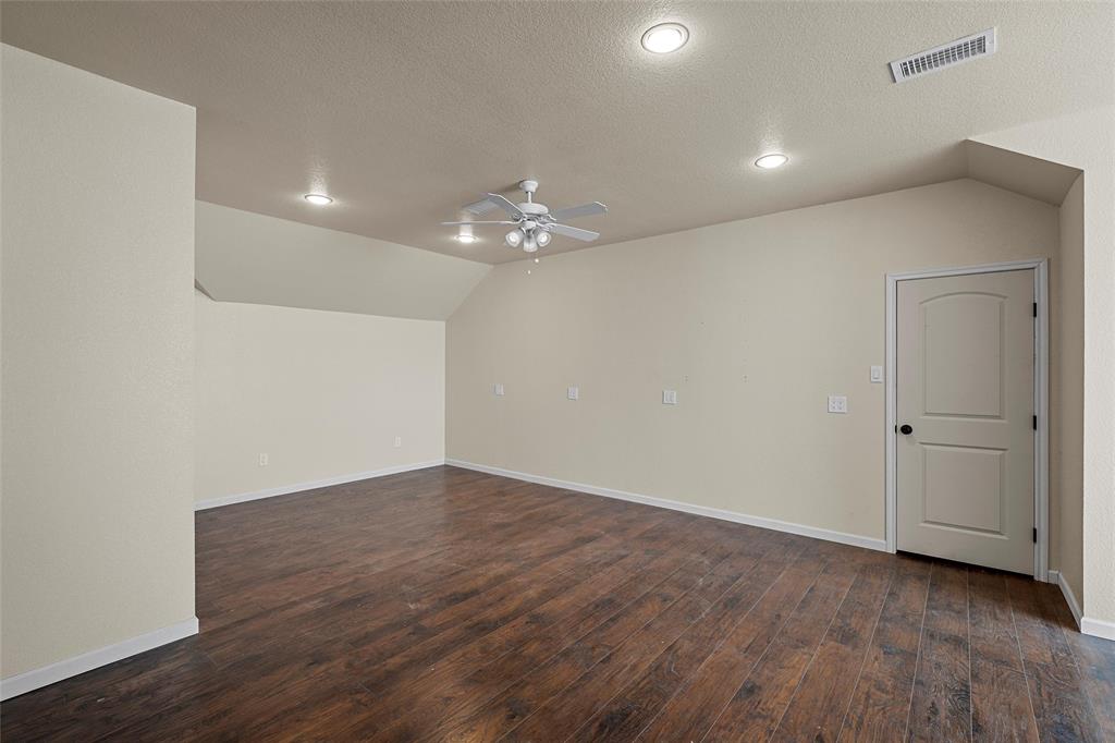 2743 Tokio Road West, TX 76691 - Photo 29 of 40 wooden floor in an empty room with a window
