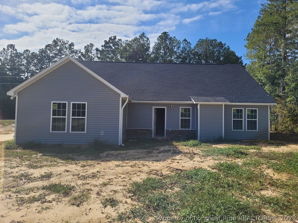 261 Tc Jones Road Raeford, NC 28376 - Photo 2 of 6 a view of a house with a yard