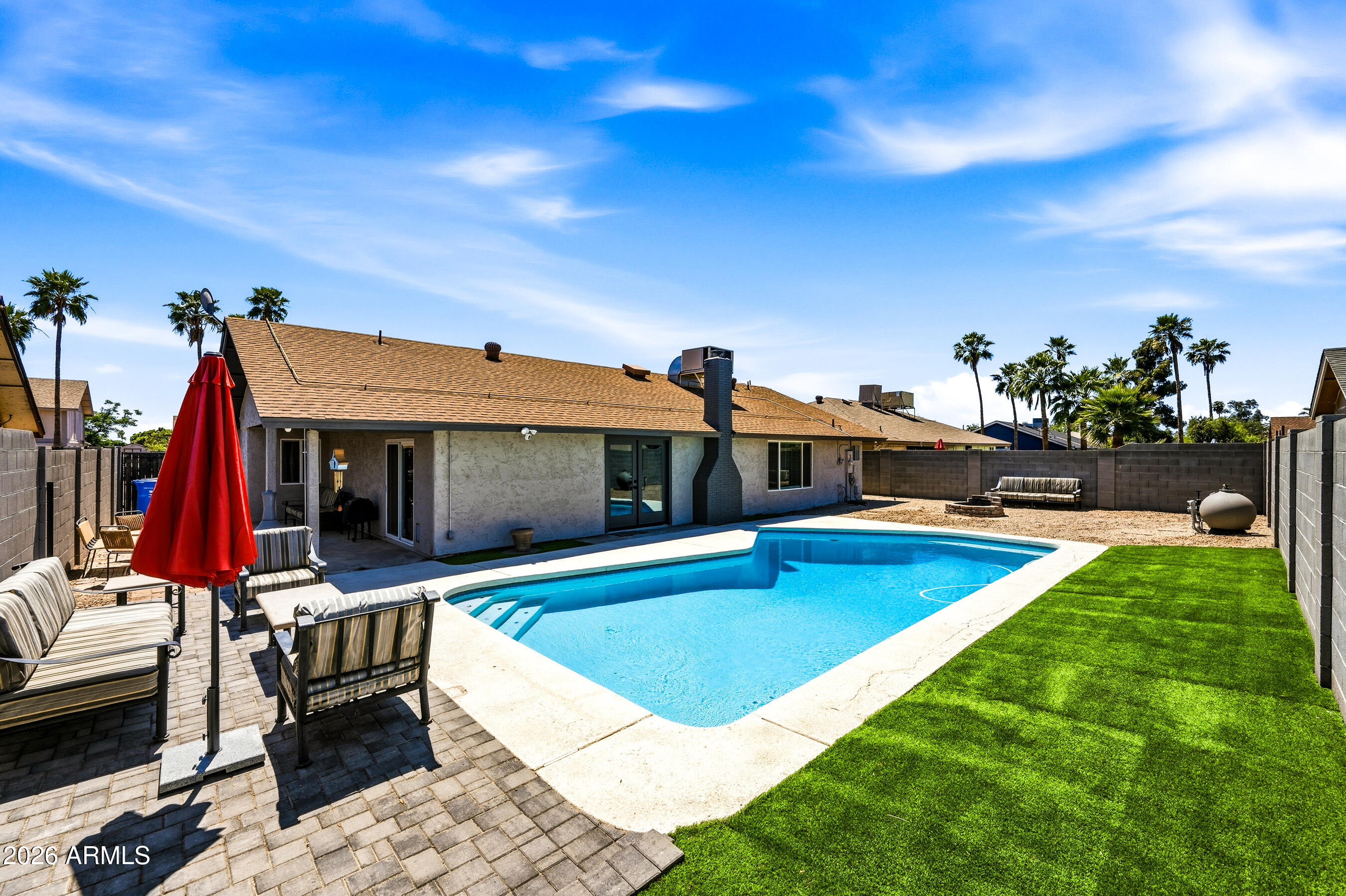 3968 West Hearn Road Phoenix, AZ 85053 - Photo 34 of 58 Backyard with Turf
