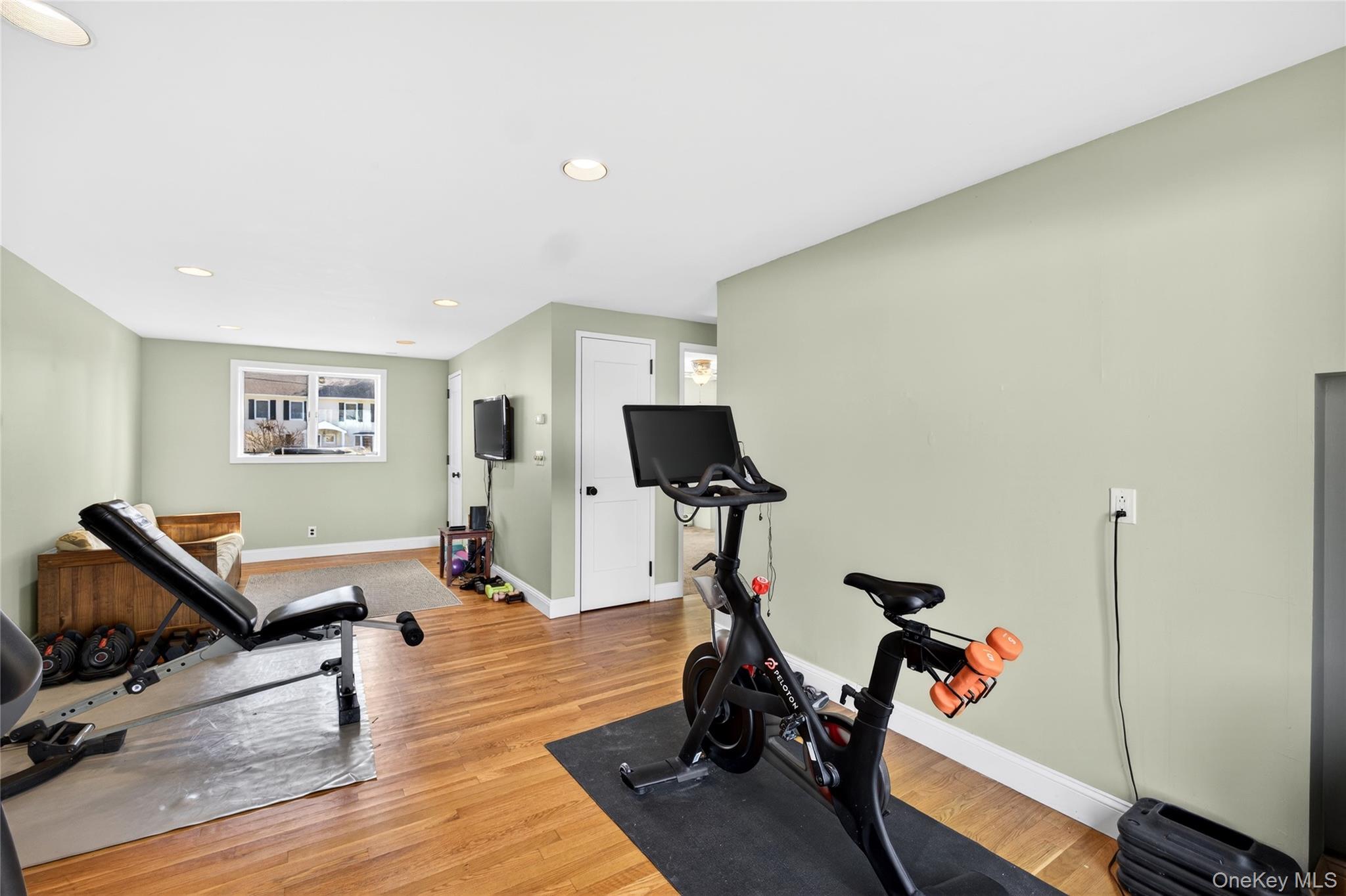 80 Ridgeview Drive Pleasantville, NY 10570 - Photo 32 of 45 Generous recreation room allows for a home gym with a view and access to the outdoors.