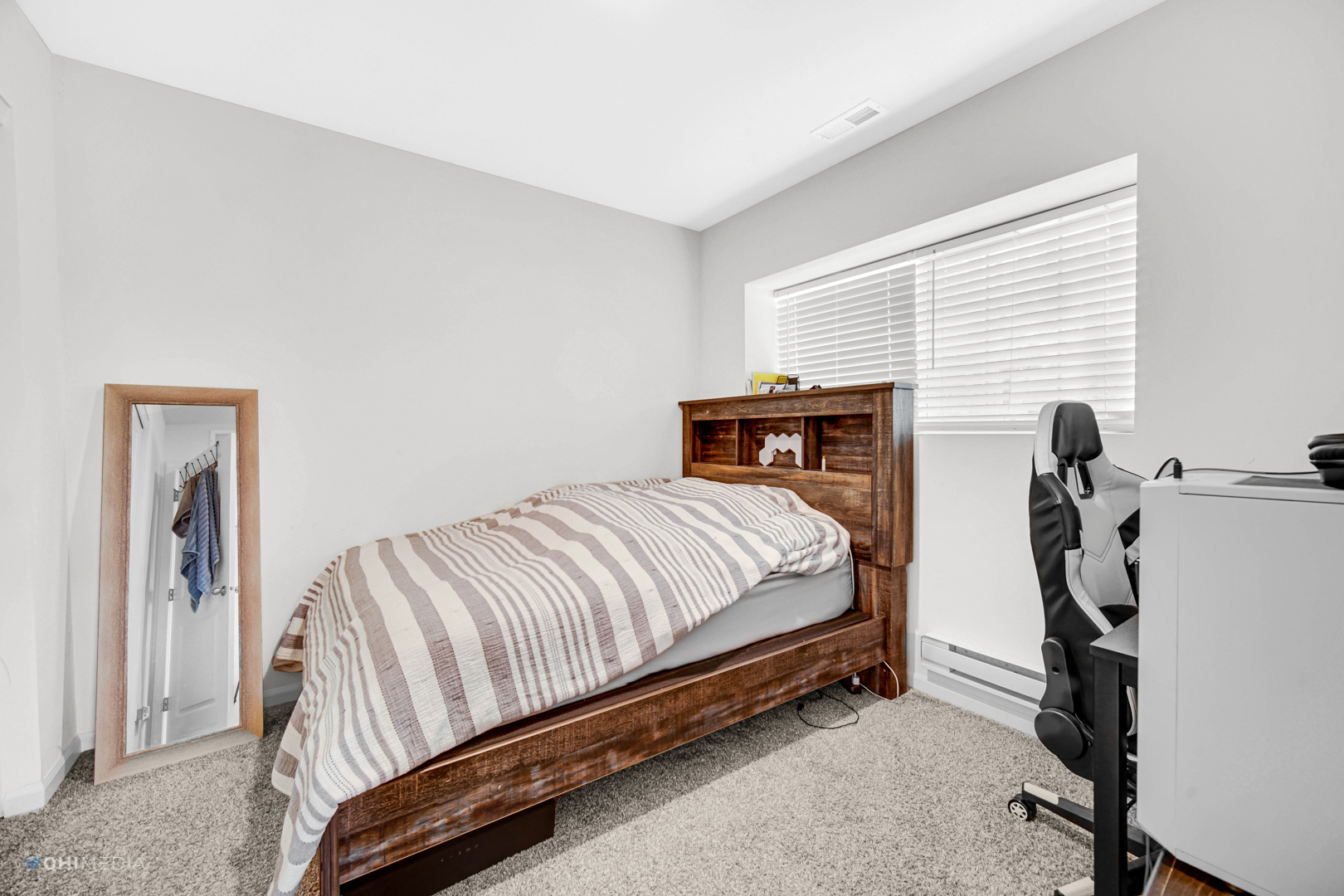 2520 Alison Avenue Pingree Grove, IL 60140 - Photo 15 of 19 a bed sitting in a room next to a window