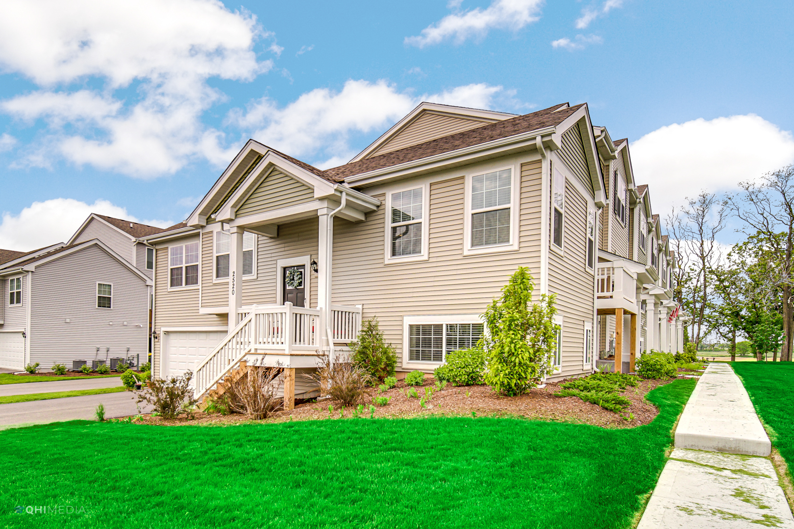 2520 Alison Avenue Pingree Grove, IL 60140 - Photo 2 of 19 a front view of a house with a yard and potted plants