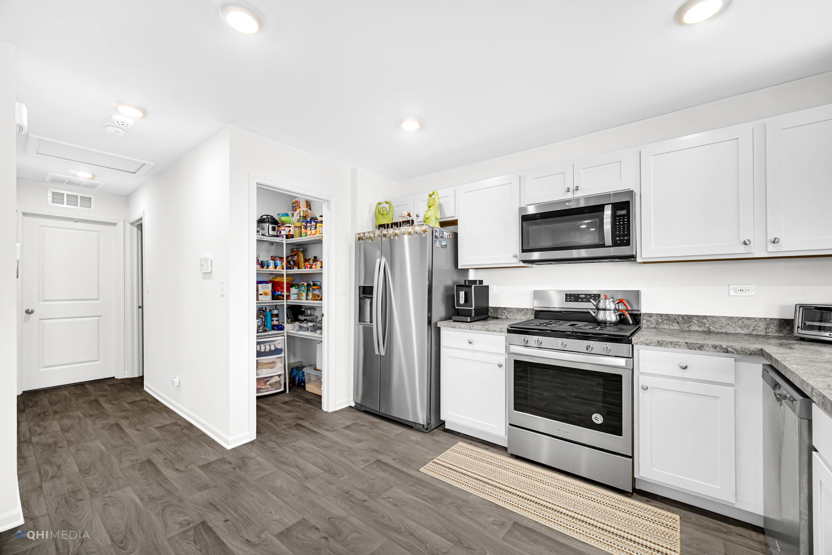 2520 Alison Avenue Pingree Grove, IL 60140 - Photo 3 of 19 a kitchen with a stove a refrigerator and a sink