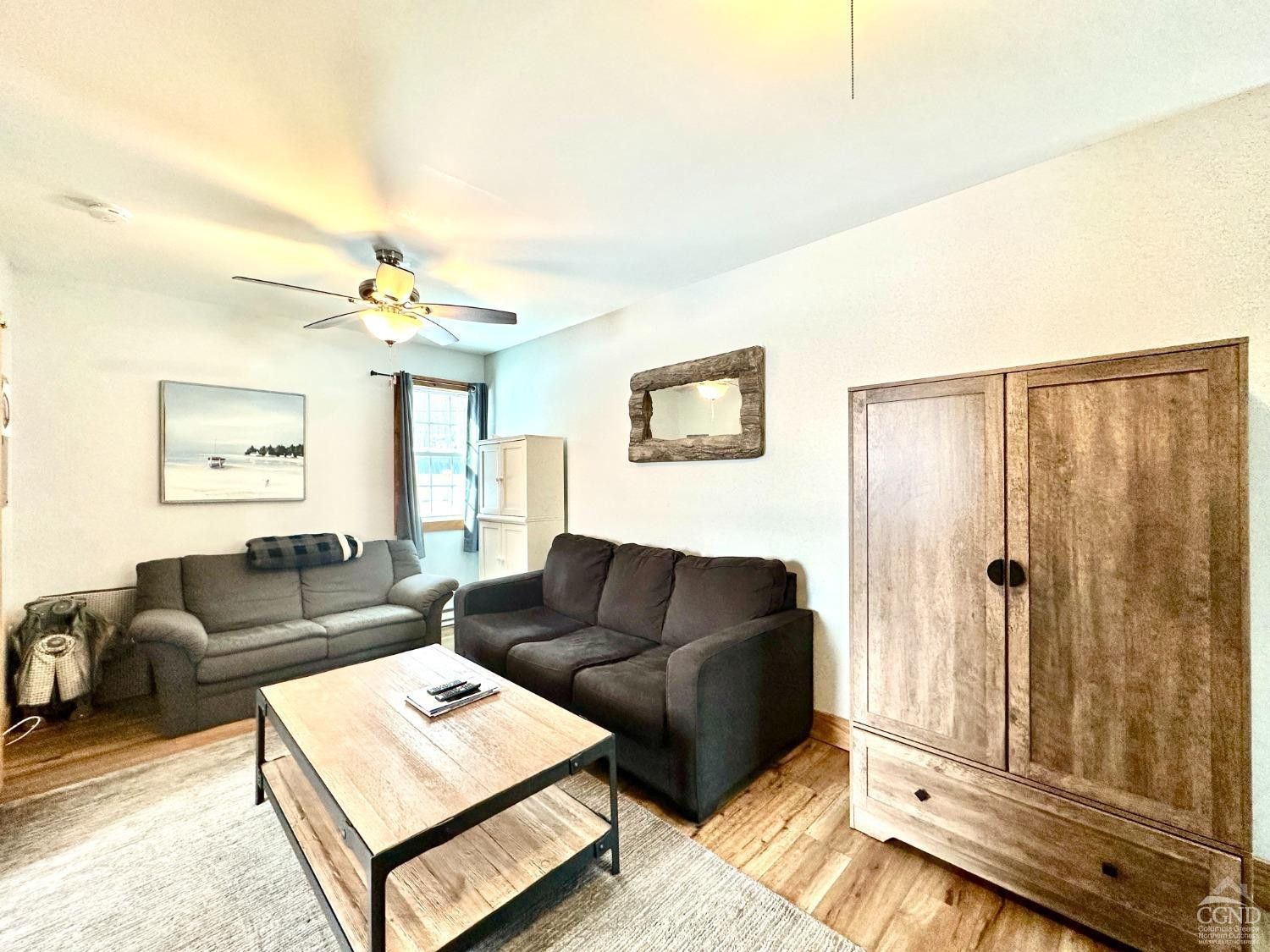 462 Dent Road Prattsville, NY 12468 - Photo 6 of 32 a living room with furniture and a lamp