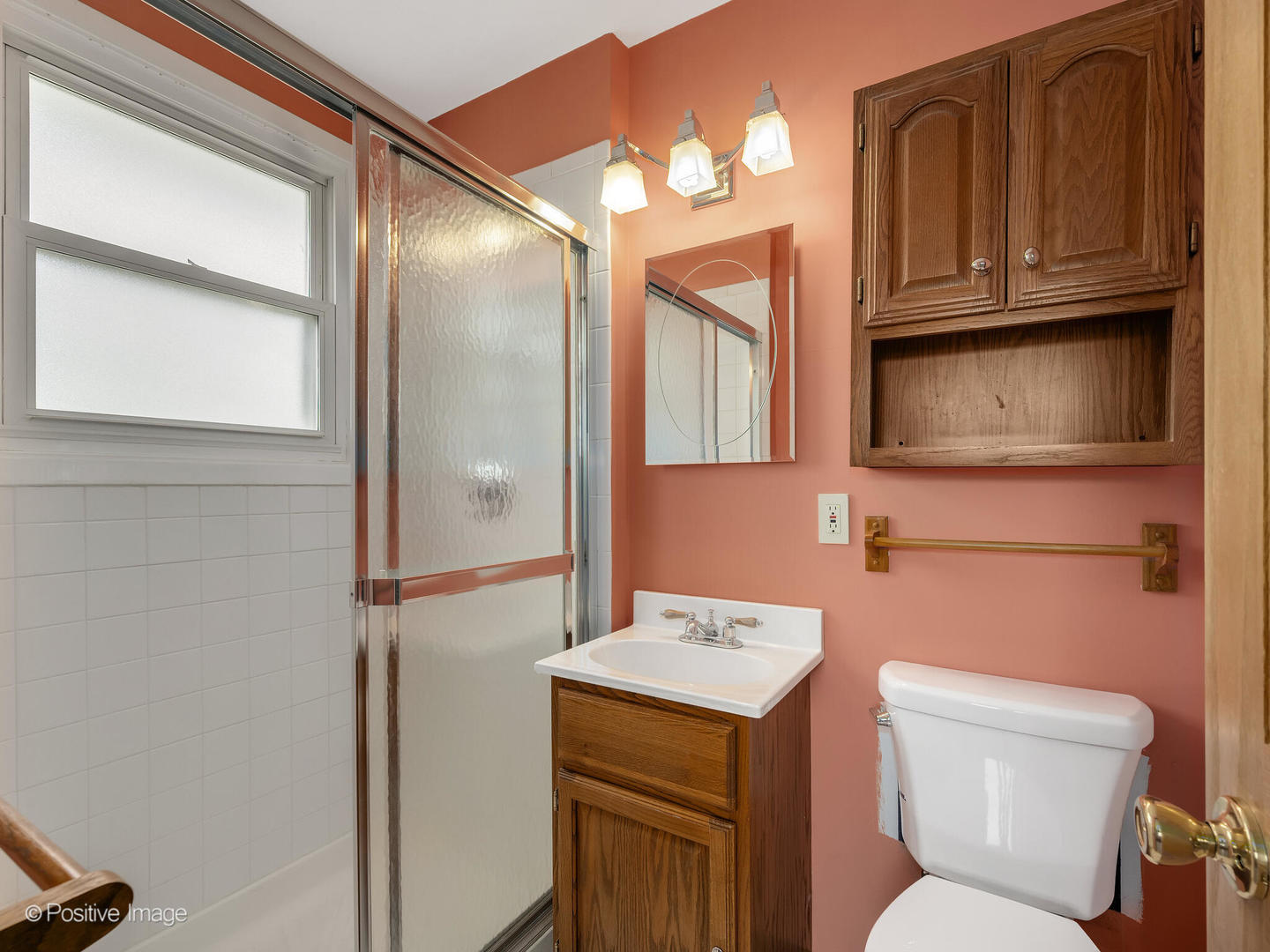 390 Arrowhead Trail Carol Stream, IL 60188 - Photo 17 of 25 a bathroom with a toilet sink and mirror