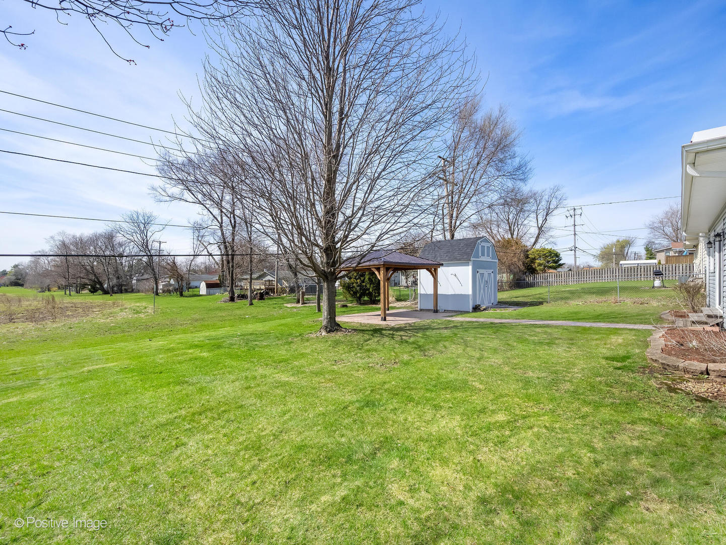 390 Arrowhead Trail Carol Stream, IL 60188 - Photo 23 of 25 a brick house with trees in front of it
