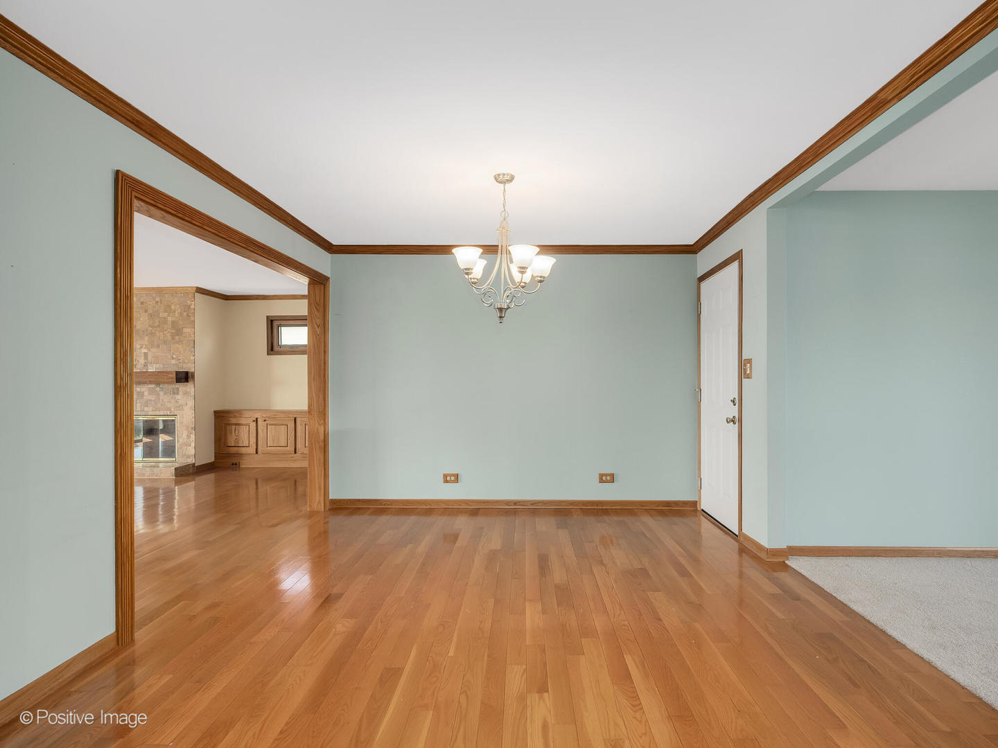 390 Arrowhead Trail Carol Stream, IL 60188 - Photo 10 of 25 a view of empty room with wooden floor and fan