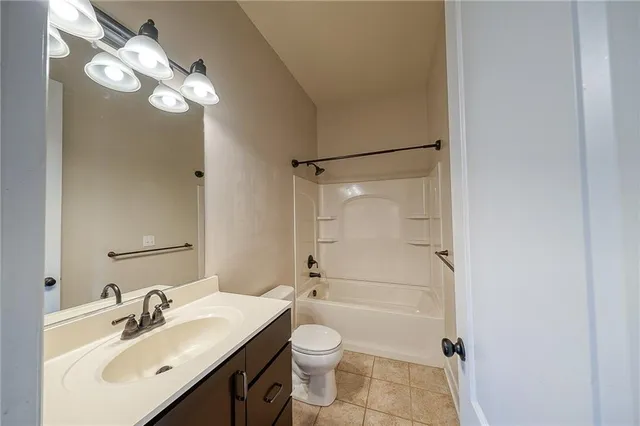a kitchen with a sink stove and refrigerator